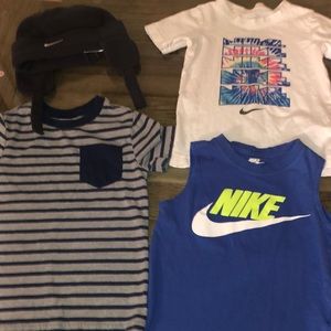 Lot of 4 items. 3 tops, and 1 snow hat.